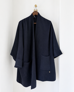 Load image into Gallery viewer, Long knit cardigan with a relaxed fit and pockets
